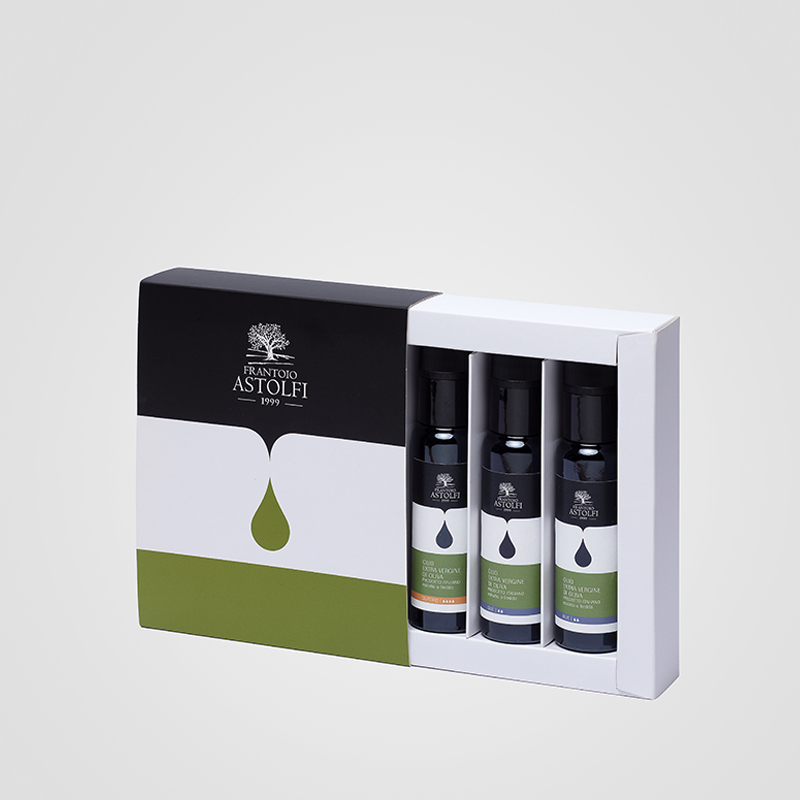 Cofanetto a fodero personalizzato con vassoio interno per tre bottiglie di olio EVO da 100 ml Frantoio Astolfi.