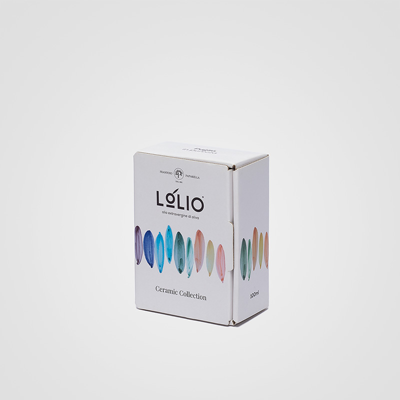Packaging a libro: scatola in cartone microonda accoppiato con alloggiamento interno per lattina d'olio in ceramica. Scatola chiusa.